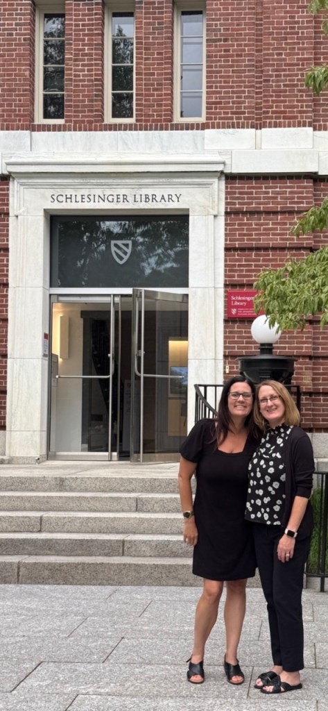 Kristen Kelly and Serene Williams in front of the Schlesinger Library